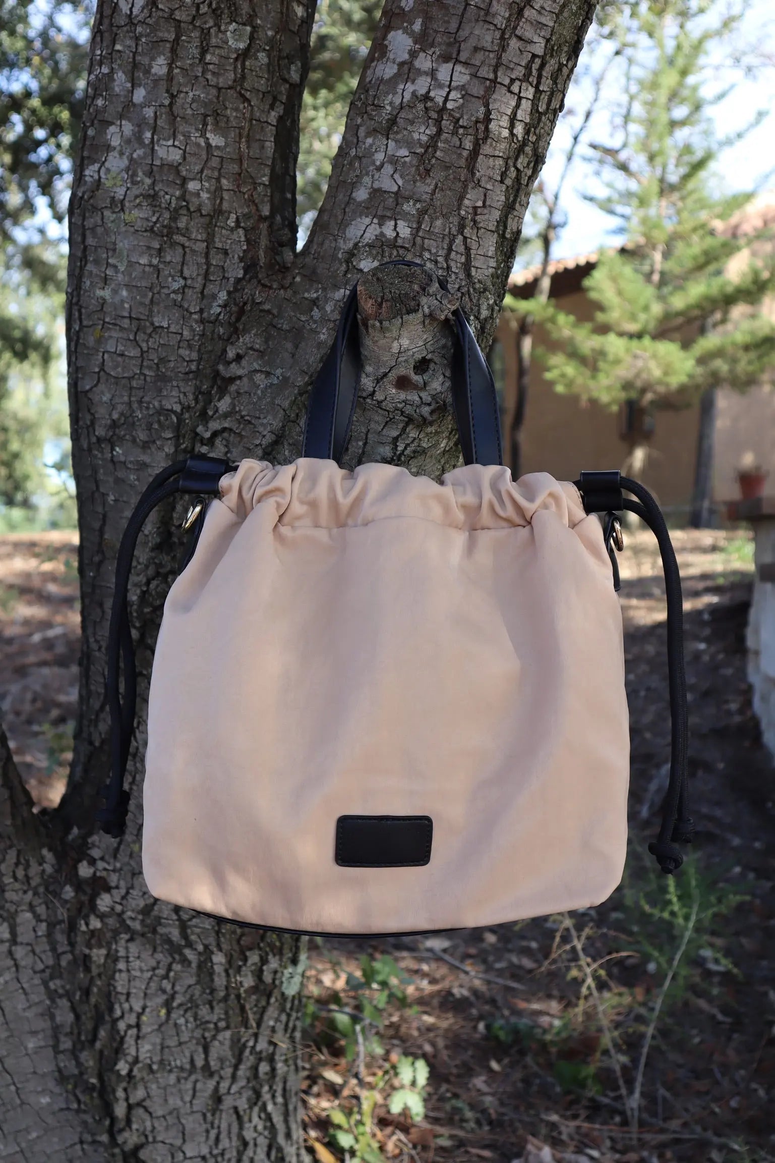 Bolso impermeable judas beige elvestidordecandela